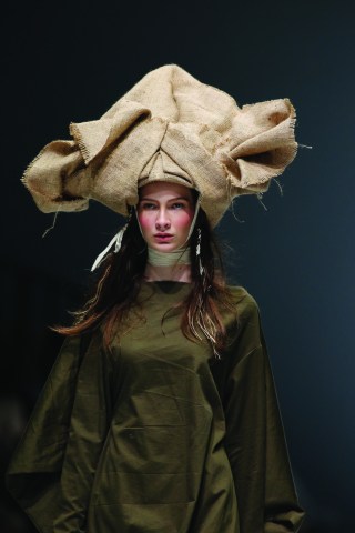 OCTOBER 24: A model walks the runway of Indonesia Fashion Forward featuring Spring Summer 2016 collection by I.K.Y.K during the Jakarta Fashion Week 2016 in Senayan City, Jakarta.