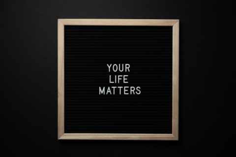 blackboard with your life matters inscription on black background