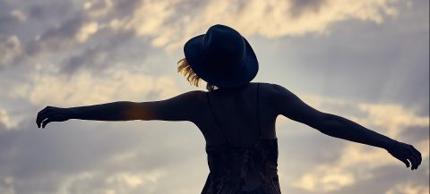 silhouette of woman during sunset
